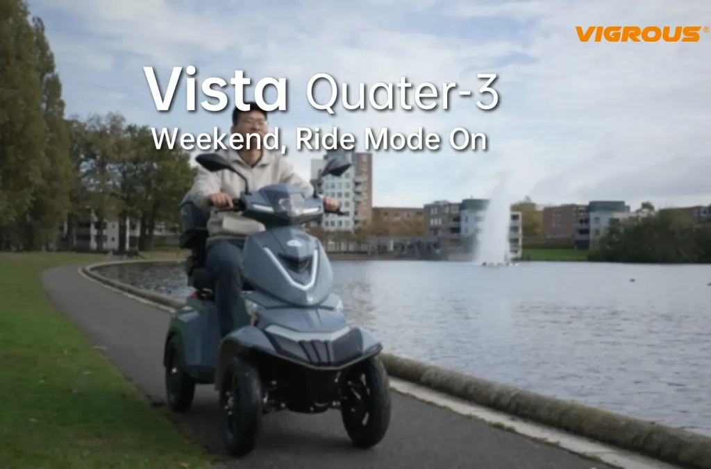 A man riding the Vista Quater-3 adult electric scooter with seat in a park.