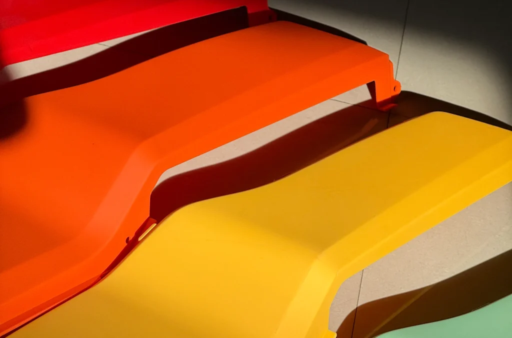 High-precision plastic body panels produced in-house for senior scooters.