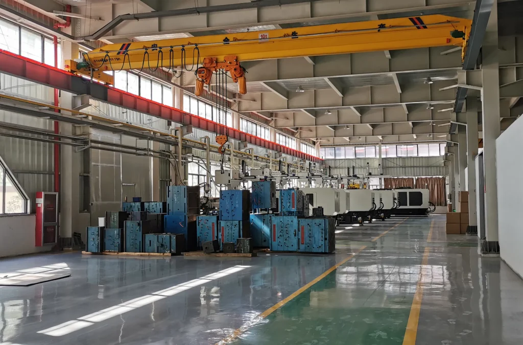 In-house heavy-duty plastic injection molding machines producing consistent body shells for our mobility electric scooters.